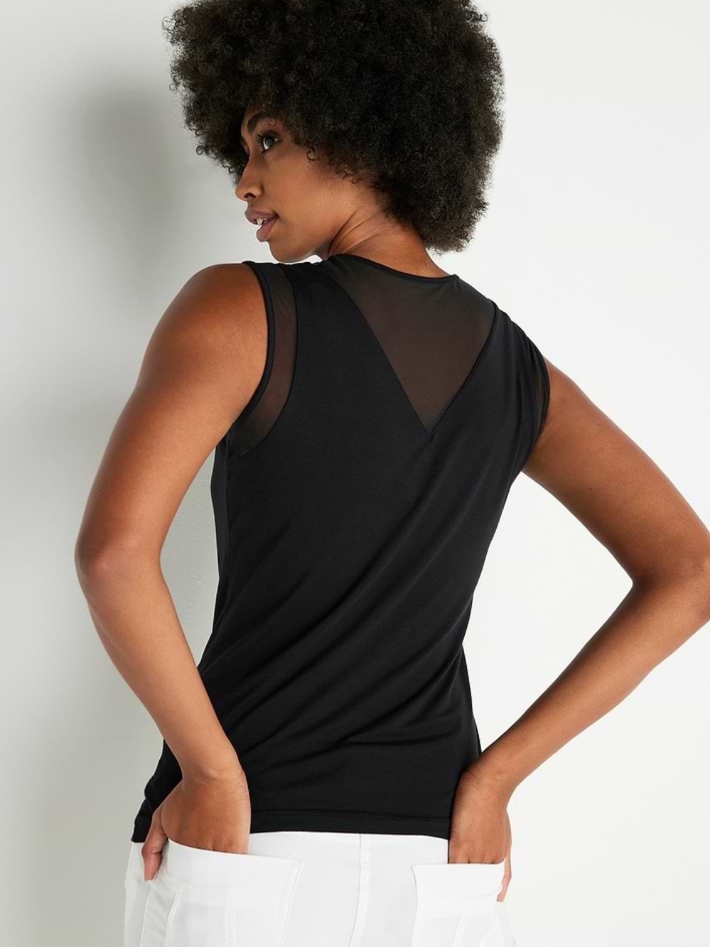 Anatomie Flo sleeveless black Pima cotton and model tank size medium